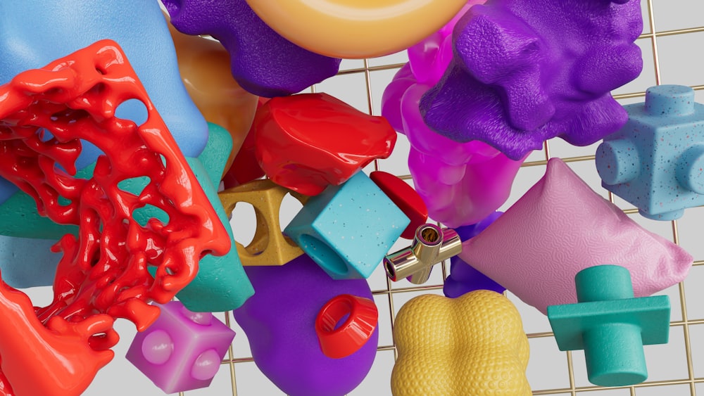 a bunch of toys that are hanging on a wall