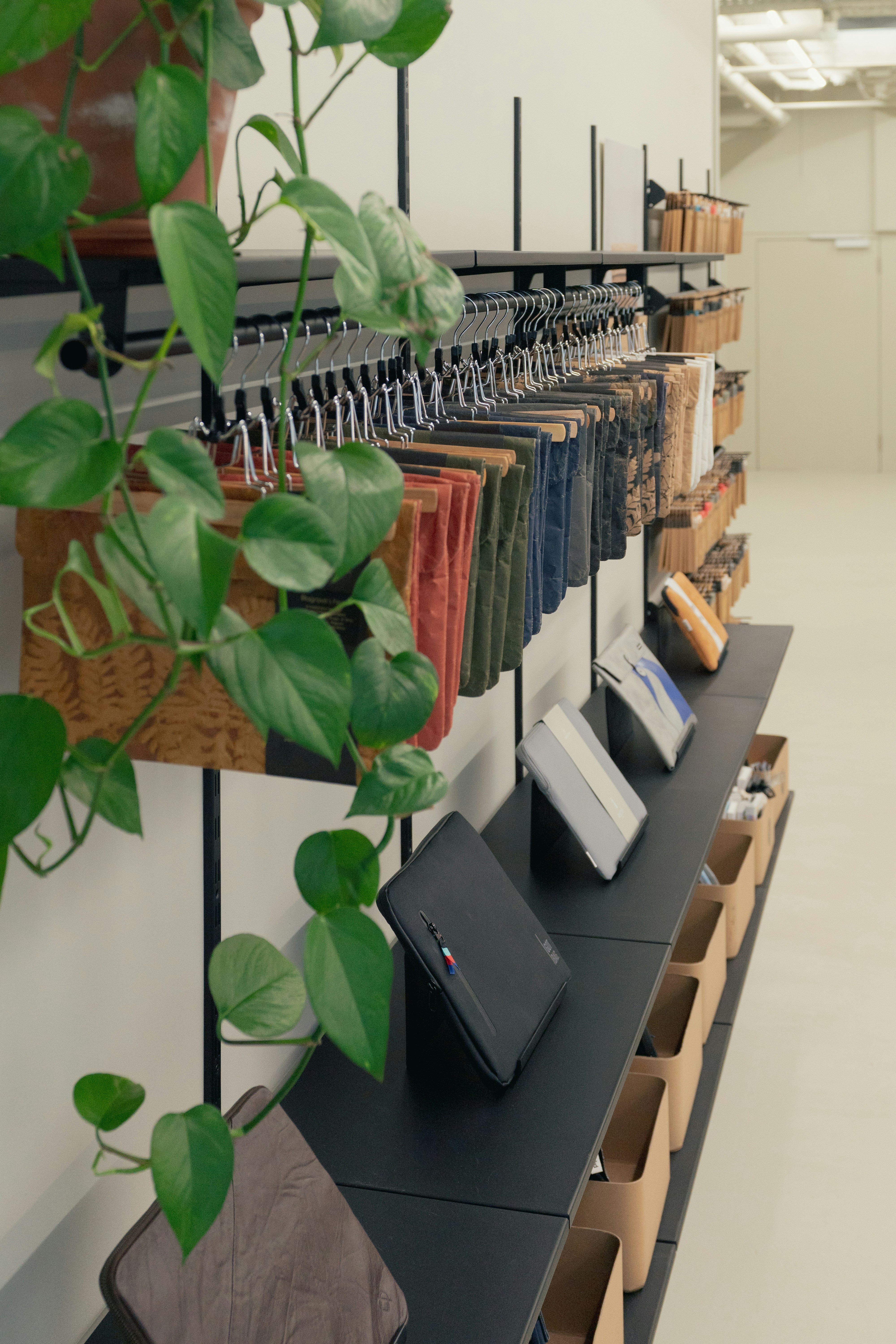 Laptop screen displaying various clothing items on a wholesale site