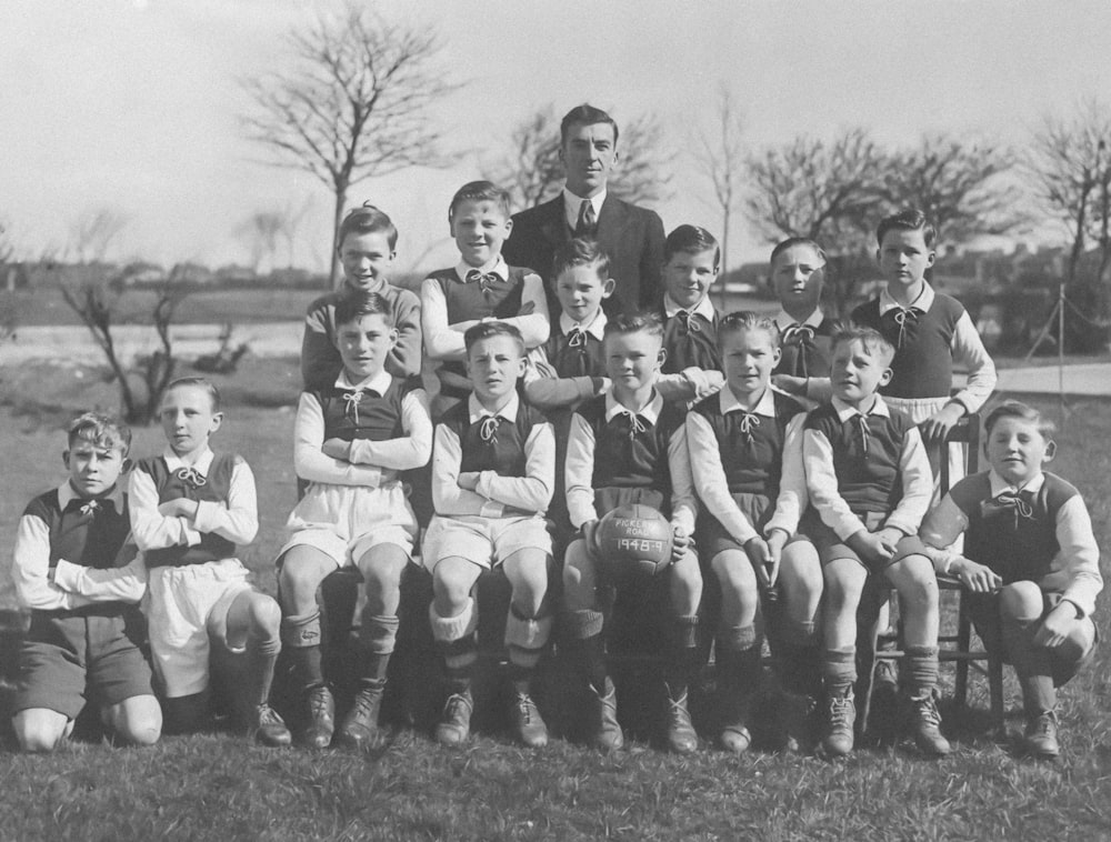 a black and white photo of a soccer team
