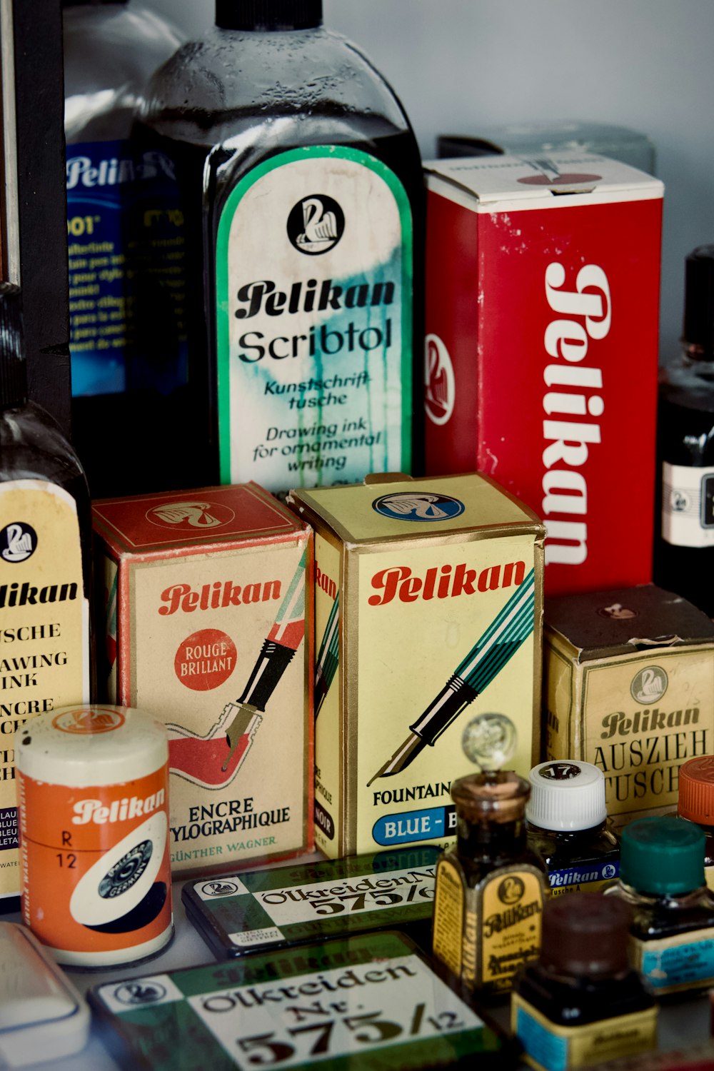 a table topped with lots of different types of alcohol