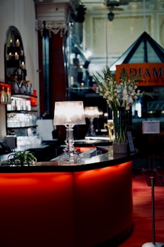 An elegant ice bar setup glowing softly with ambient lights.