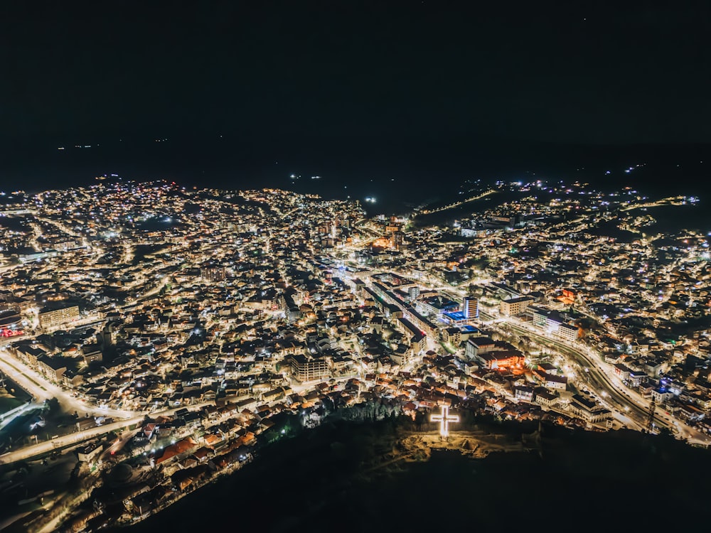 an aerial view of a city at night