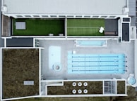 Covered swimming pool in a sports facility powered by green energy solutions.