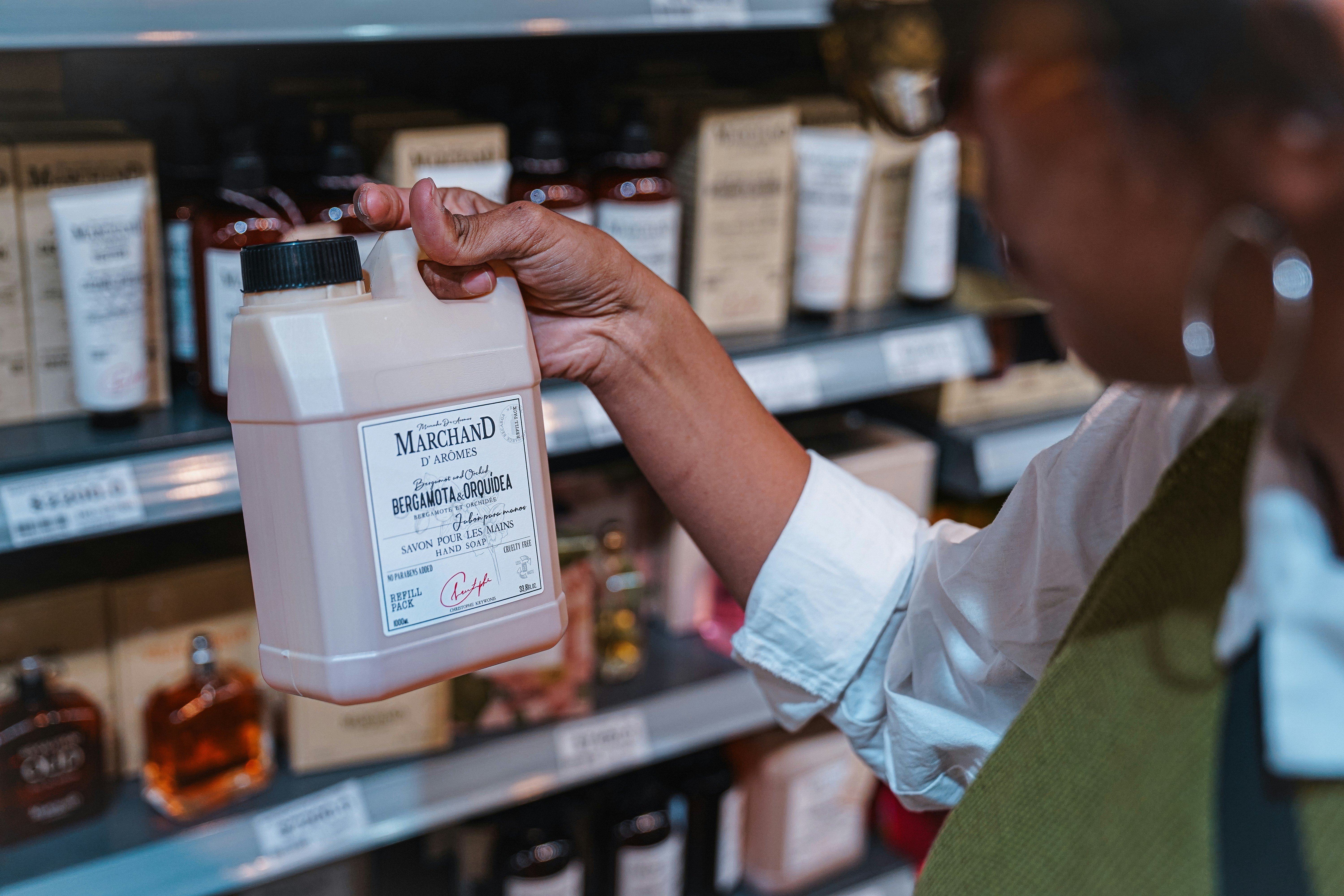 shopper carefully checking an ingredient label - simple vegan grocery tips