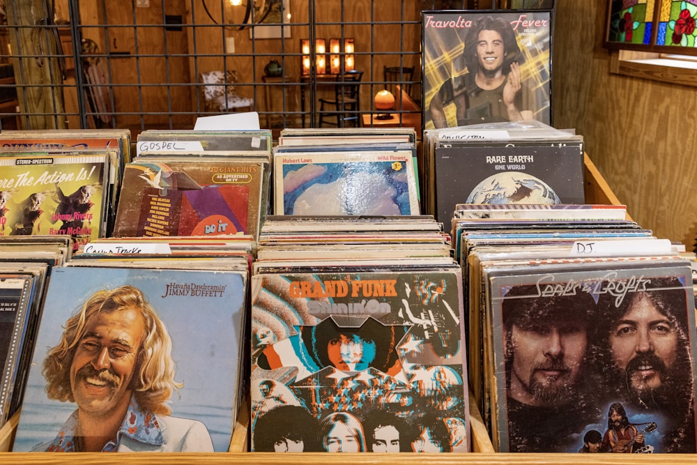 a bunch of cds that are sitting on a table