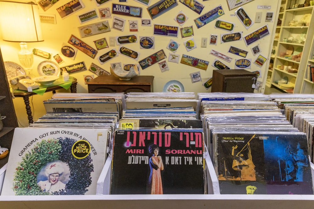 a bunch of records that are on a table