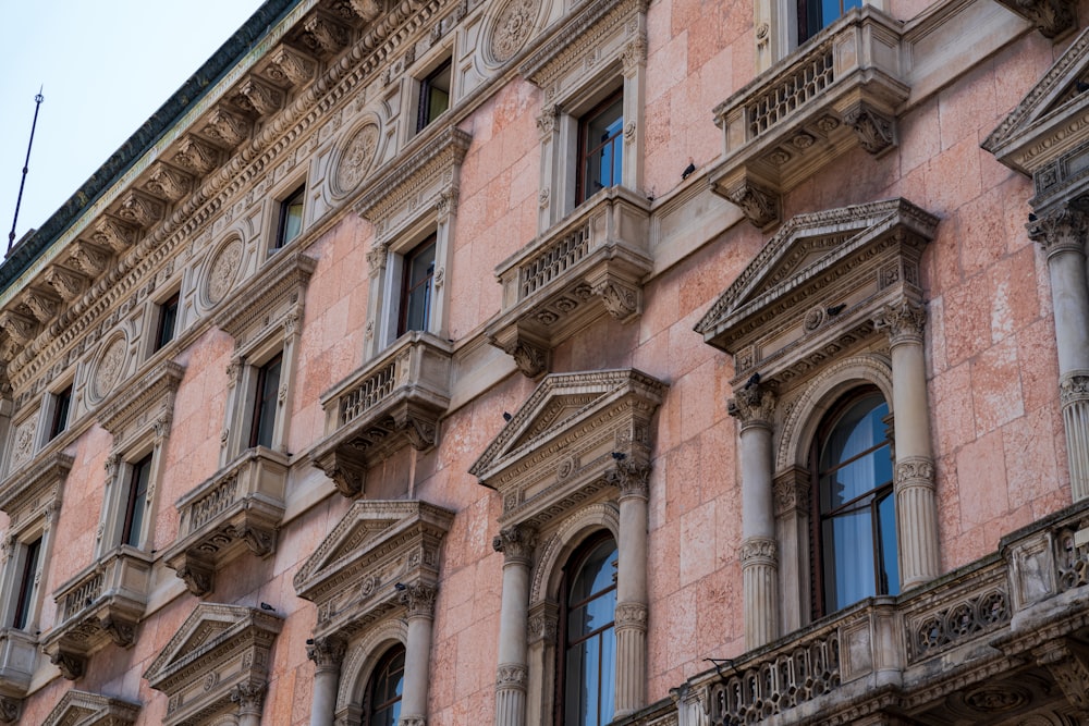 a large building with many windows and balconies