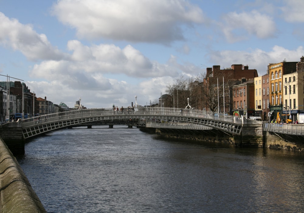 a bridge over a river in a city