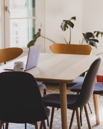 a table with a laptop on top of it