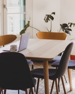 a table with a laptop on top of it