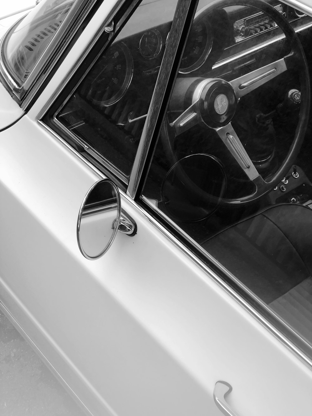 the interior of a car with a steering wheel