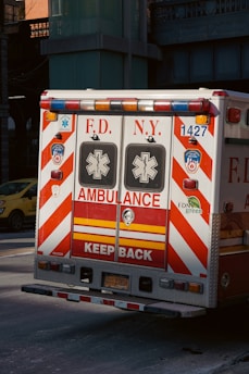 an ambulance is parked on the side of the road