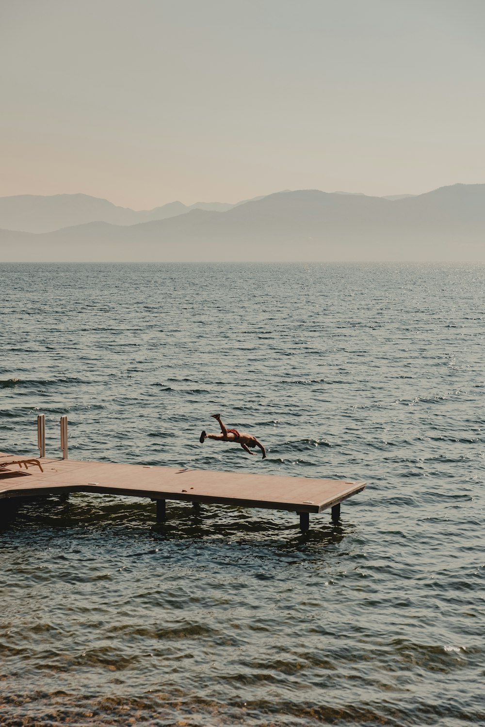 a dock in the middle of a body of water