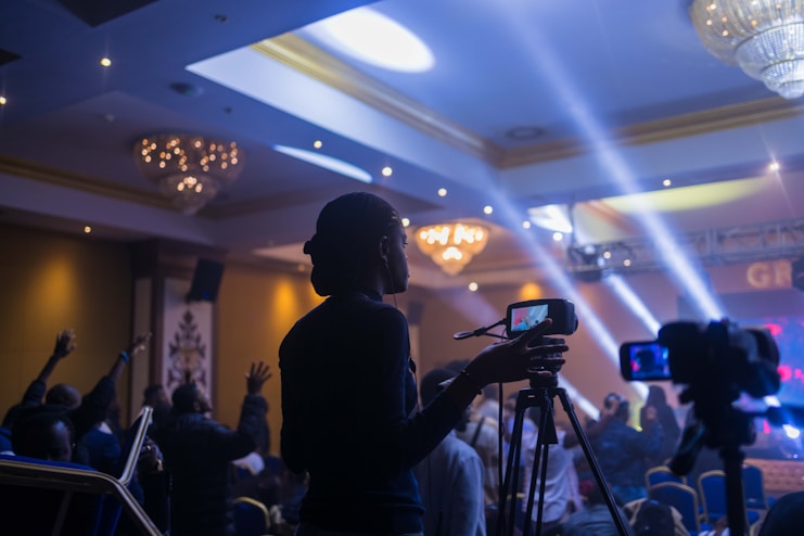 a person taking a picture with a camera