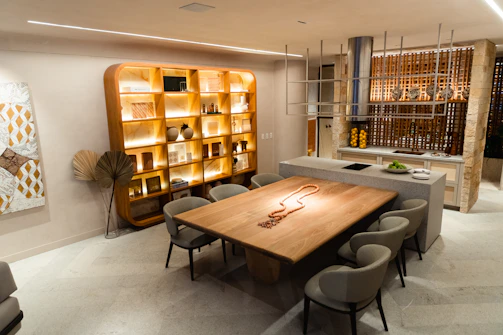 Modern dining area render with artistic lighting fixtures and carefully chosen decor accents.