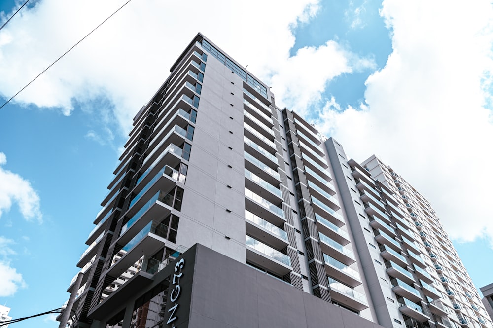 a tall building with a sky background