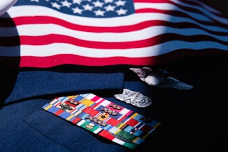 a close up of a tie with a flag in the background