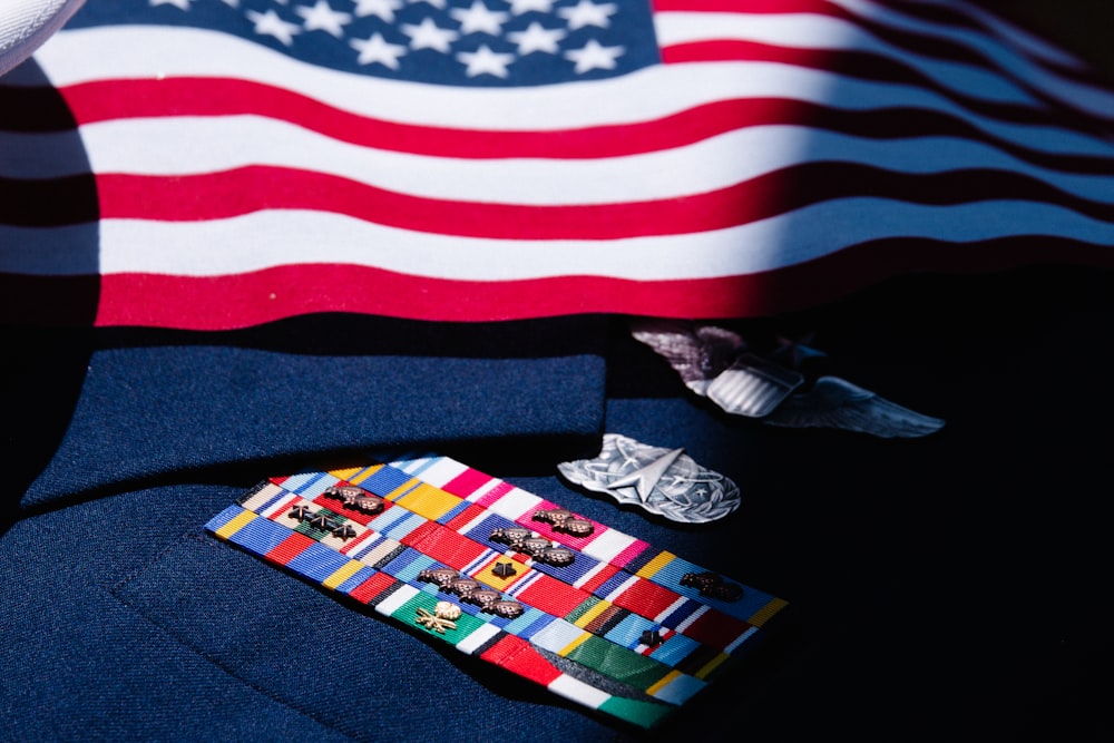 a close up of a tie with a flag in the background