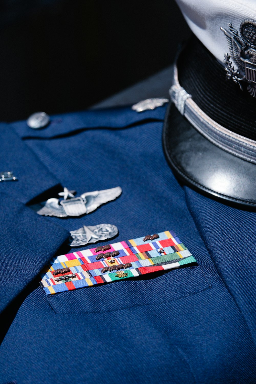 a close up of a uniform with a hat on top of it
