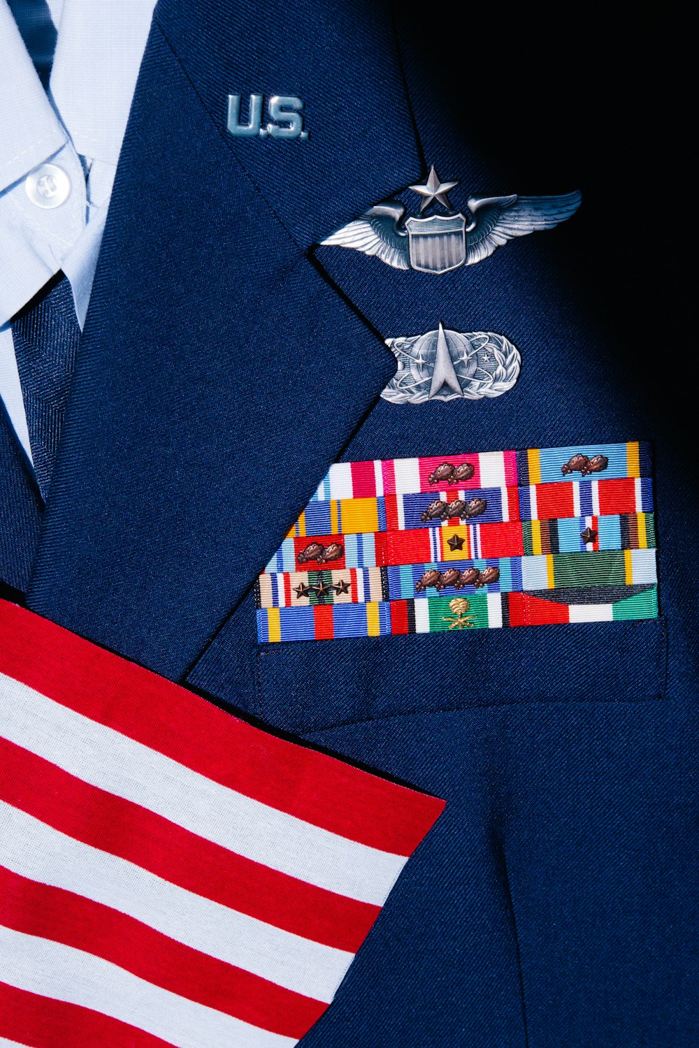 a close up of a uniform with a flag
