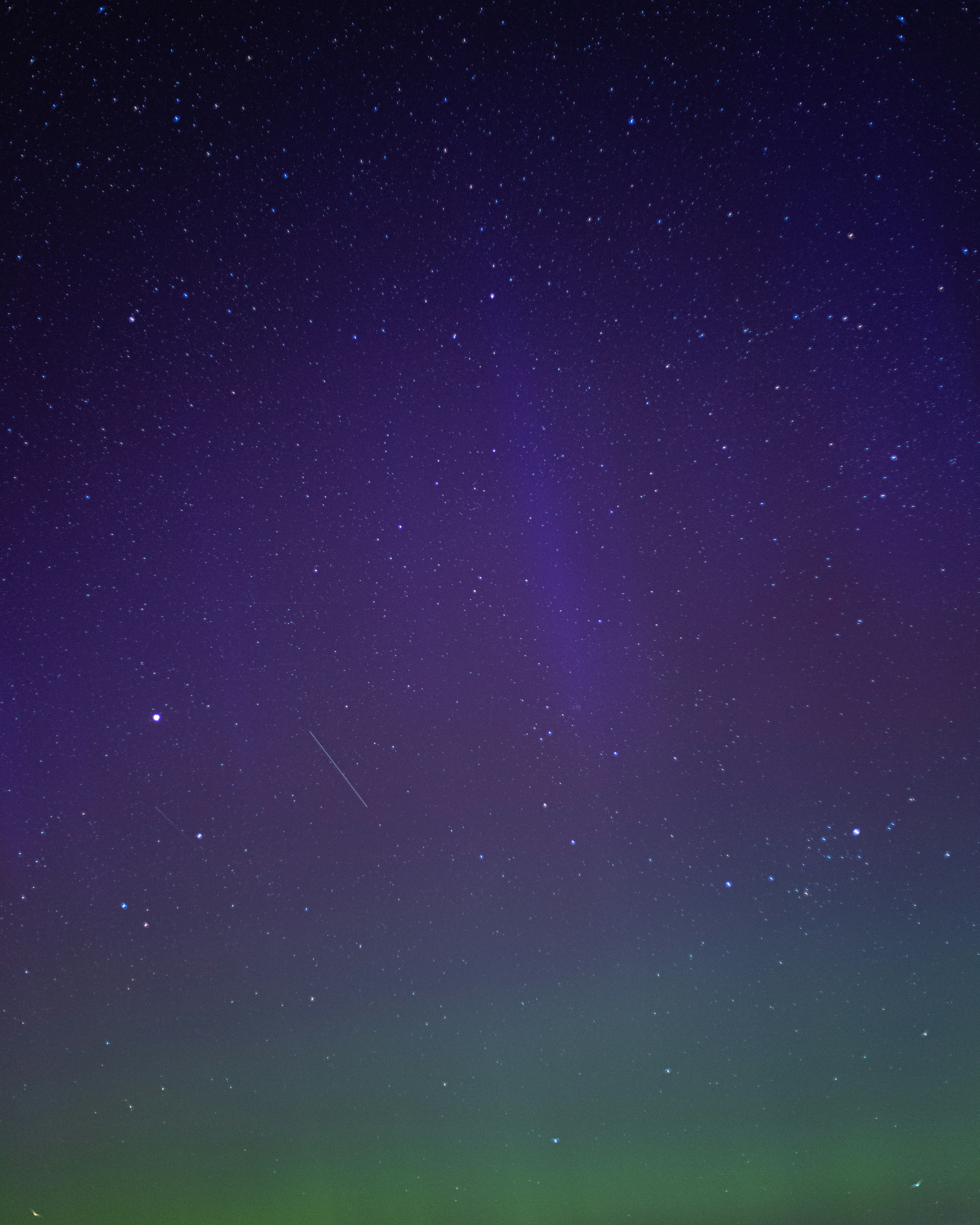 A green and purple sky filled with stars photo – Free Belarus Image on ...