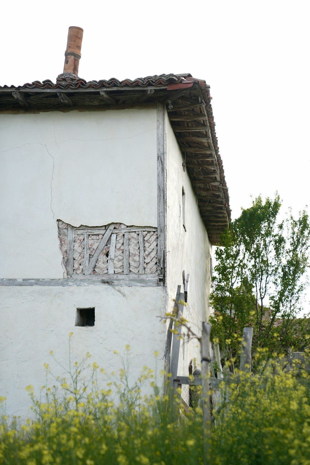 a white building with a sign on the side of it