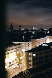 Elegant cityscape at night with illuminated buildings and streets