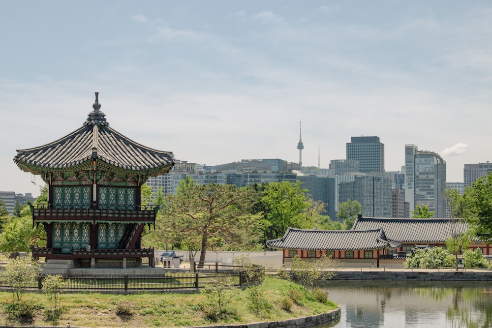 a small pagoda in the middle of a park