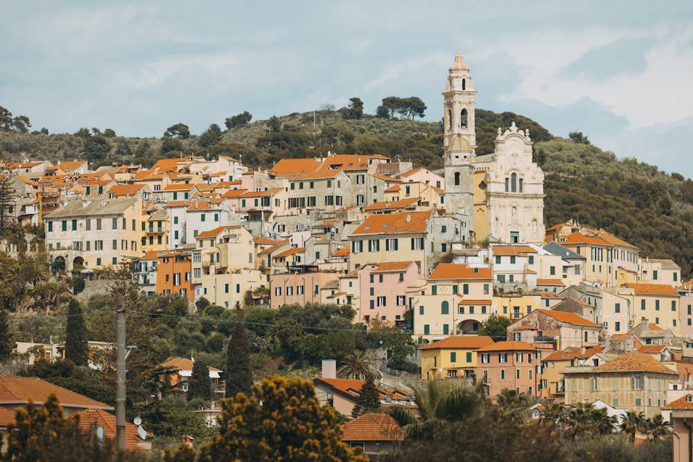 a city with many buildings and a clock tower