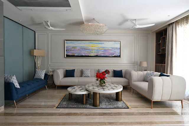 A living room with art on the wall