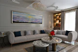 A living room, art and furniture