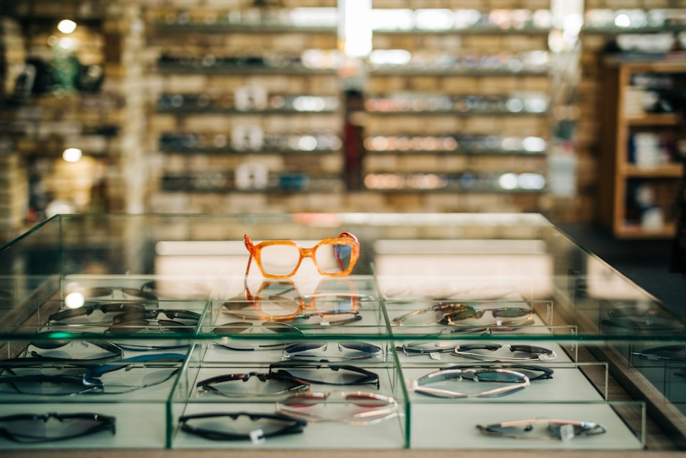 a display case filled with lots of glasses