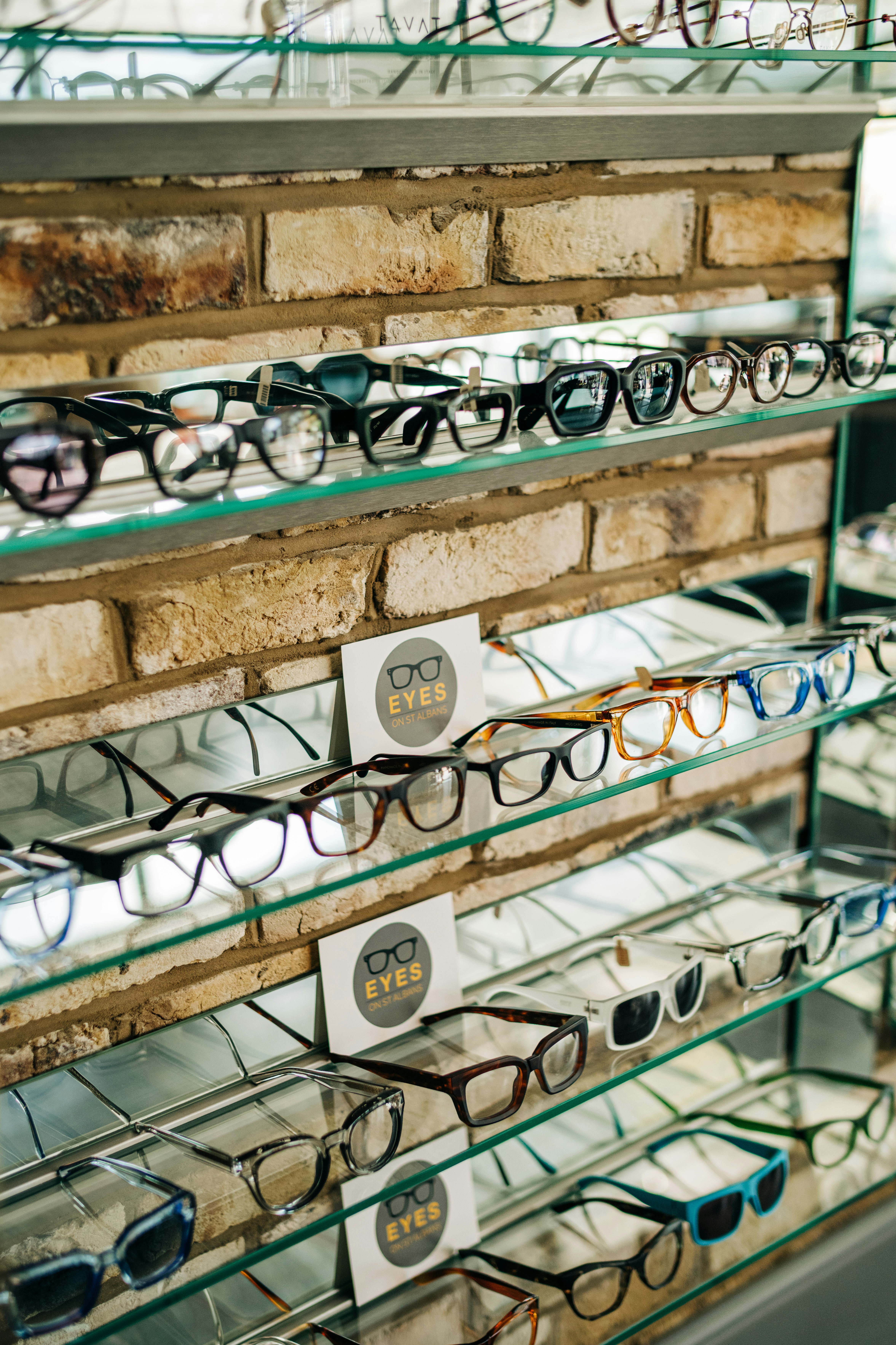 a display case filled with lots of glasses