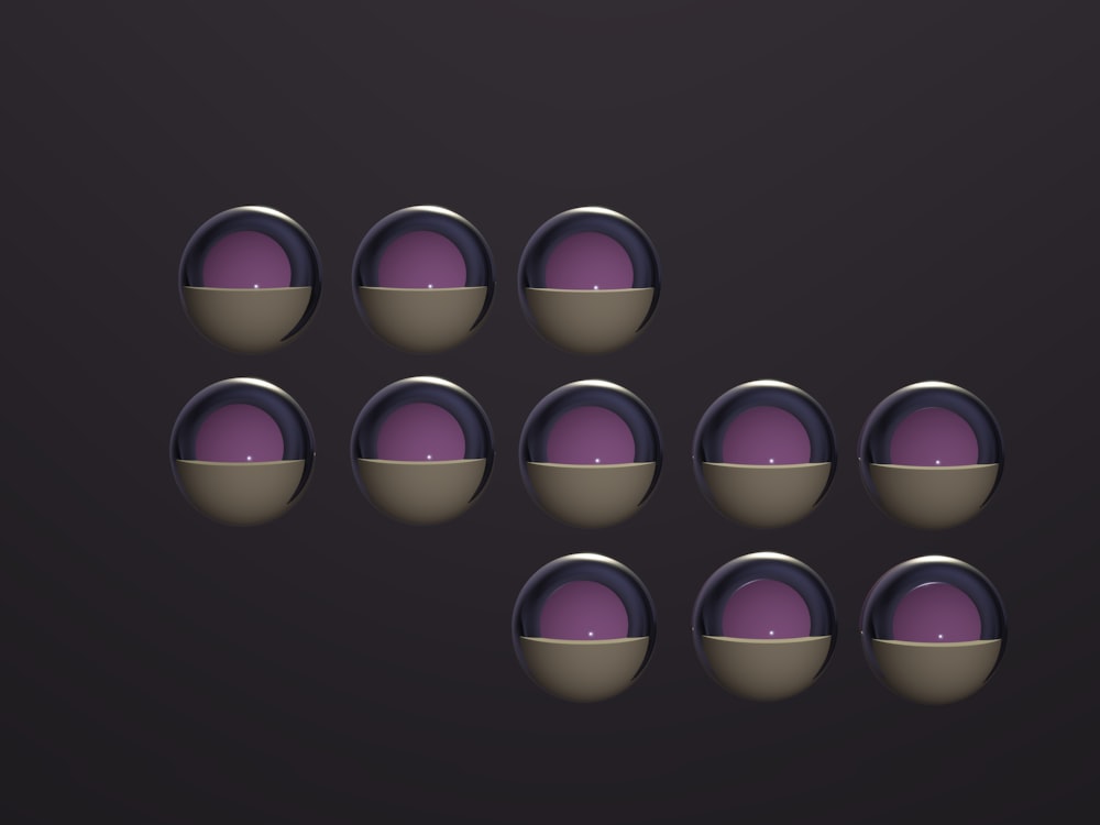 a group of purple balls sitting next to each other