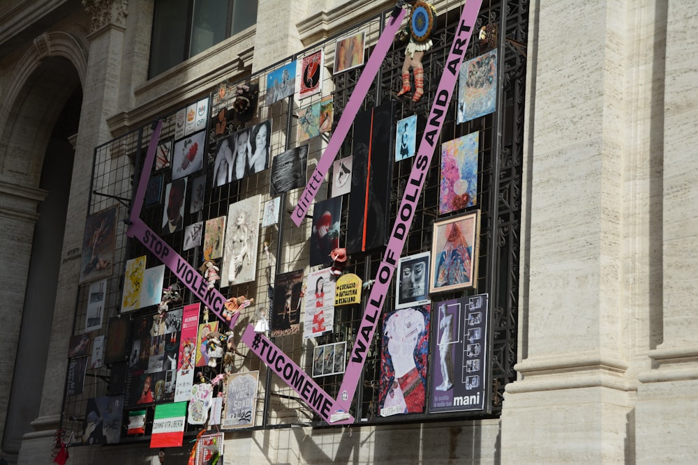 a building that has a bunch of posters on it