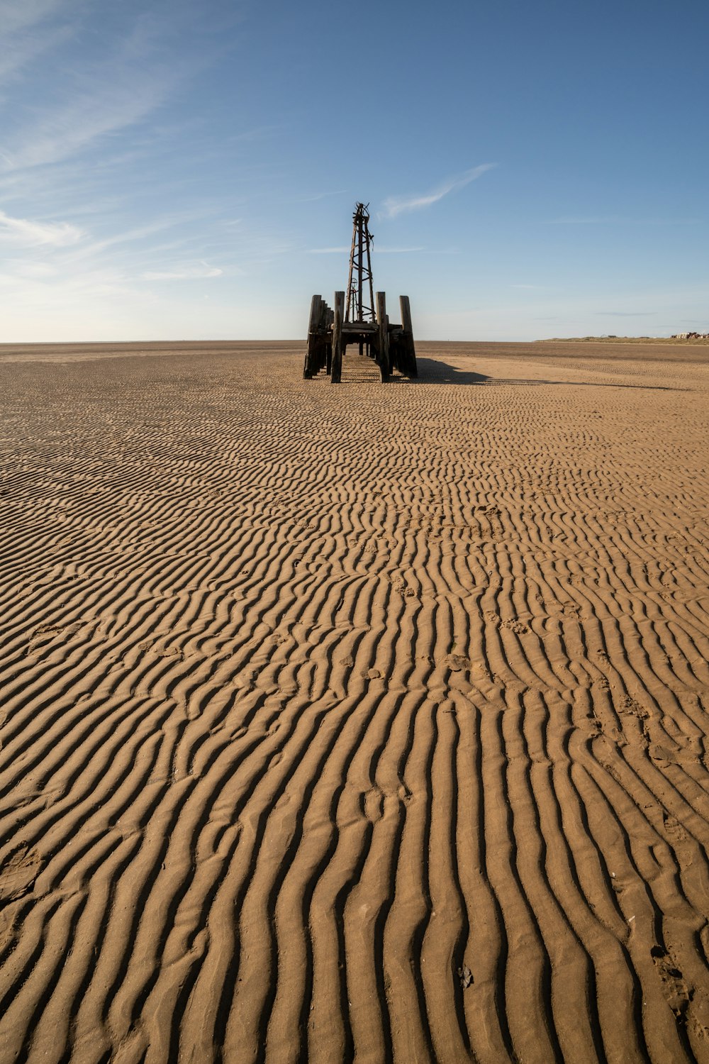 a drilling rig in the middle of a desert