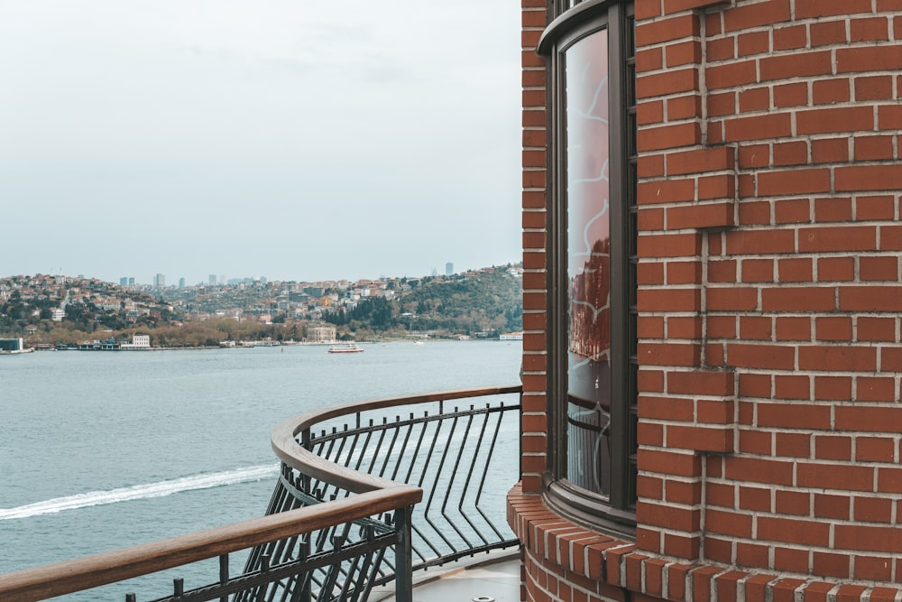 a view of a body of water from a brick building