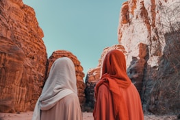 a couple of women standing next to each other