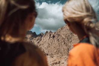 a couple of women standing next to each other