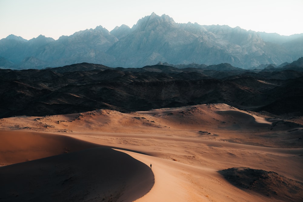 a view of a mountain range in the desert