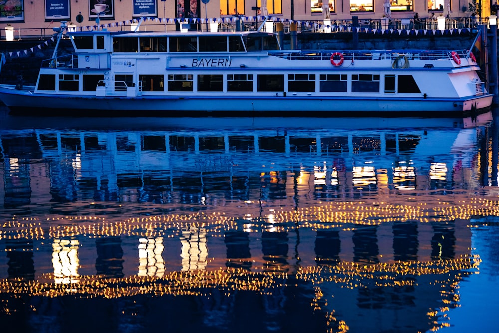 a large boat floating on top of a body of water