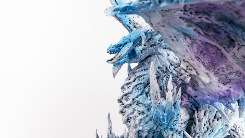 a close up of a blue and purple sculpture