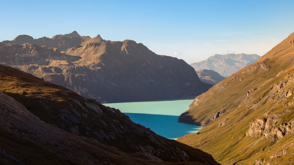 a mountain range with a lake in the middle of it