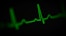 a green heart beat on a black background