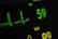 Detailed view of an electrocardiogram (EKG) monitor displaying heart rate and oxygen saturation levels. The heart rate is shown as 59 beats per minute, and an EKG waveform is visible. The SpO2 level is displayed in yellow.