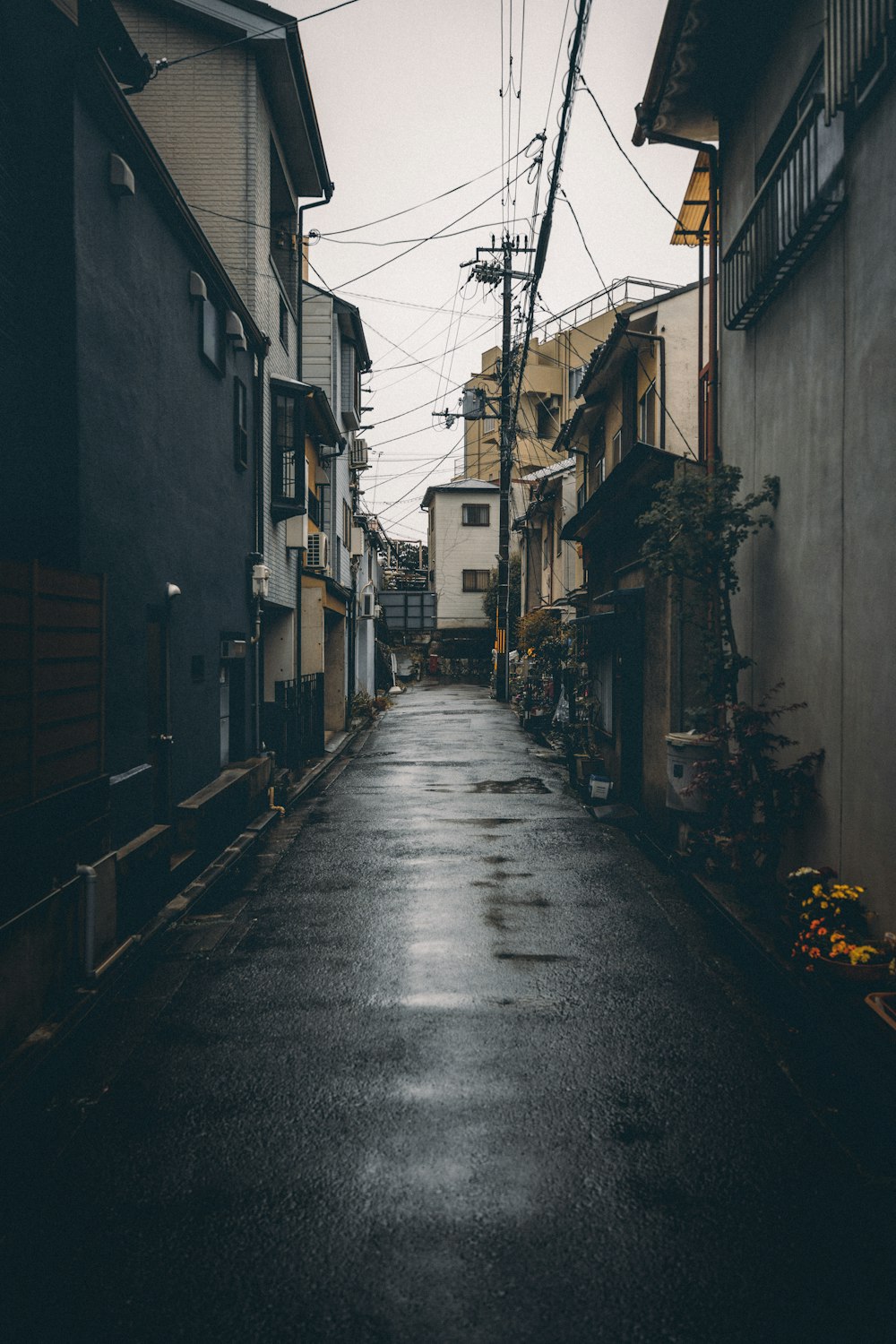 a narrow street with buildings on both sides