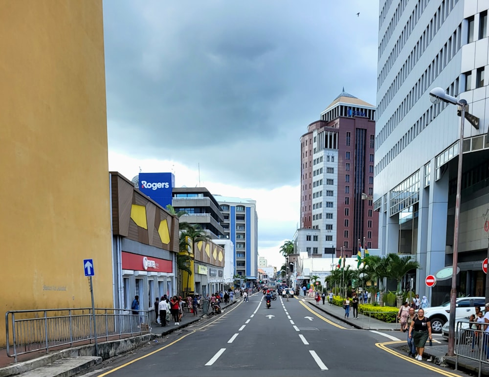 a street lined with tall buildings next to tall buildings