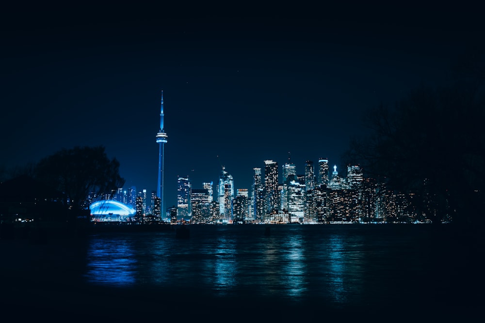 a view of a city at night from across the water