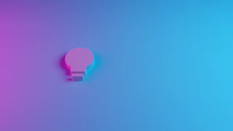 Clean line icon of a gear with a lightbulb inside, symbolizing innovative solutions.