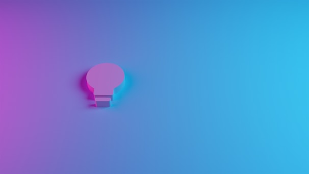 Minimalist line icon of a lightbulb representing creative brand strategy.